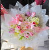 Spring Parade - Deluxe. An arrangement by Geni's Florist and Gifts.