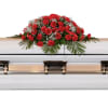 Red Elegance Casket Spray - Deluxe. An arrangement by Anne Marie Rose Floral Design.