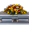 Joyful Remembrance Casket Spray - Premium. An arrangement by Anne Marie Rose Floral Design.