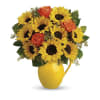 Teleflora Sunny Day Pitcher of Sunflowers - Premium. An arrangement by Marivel's Florist and Gifts.