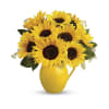 Teleflora Sunny Day Pitcher of Sunflowers - Deluxe. An arrangement by Marivel's Florist and Gifts.
