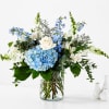 Coastal Bloom - Deluxe. An arrangement by Bill's Flowers Arrangements.