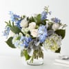 Clear Skies - Premium. An arrangement by Bill's Flowers Arrangements.