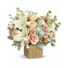 Teleflora's Desert Sunrise - Premium. An arrangement by Marivel's Florist and Gifts.