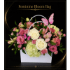 Feminine Bloom Bag - Standard. An arrangement by Berlin Flower Shop.