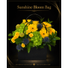 Sunshine Bloom Bag - Premium. An arrangement by New Britain Flower Shop.