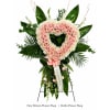 Heartfelt Tribute Heart Wreath - Premium. An arrangement by Berlin Flower Shop.