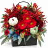 Crimson Embrace Bloom Bag - Deluxe. An arrangement by New Britain Flower Shop.