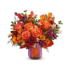 Teleflora's Amber Glow Bouquet - Deluxe. An arrangement by Marivel's Florist and Gifts.