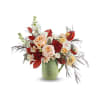 Teleflora's Pour It On Bouquet - Standard. An arrangement by Marivel's Florist and Gifts.