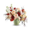 Teleflora's Pour It On Bouquet - Premium. An arrangement by Marivel's Florist and Gifts.