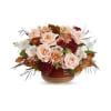 Teleflora's Sunset Stone Centerpiece - Deluxe. An arrangement by Marivel's Florist and Gifts.
