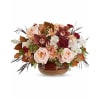 Teleflora's Sunset Stone Centerpiece - Premium. An arrangement by Marivel's Florist and Gifts.