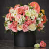 BLUSH GARDEN ROMANCE - Premium. An arrangement by Daisy's Flower Shop.