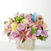 A Eggcellent Blooms Basket - Premium. An arrangement by Honie Rose Design.