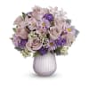 The Teleflora's Playful Love Bouquet - Premium. An arrangement by Marivel's Florist and Gifts.