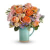 The Teleflora's Aqua Rose Bouquet - Premium. An arrangement by Marivel's Florist and Gifts.