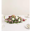Romantic Blush™ Centerpiece - Standard. An arrangement by Sicola's Florist.