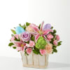 A Eggcellent Blooms Basket - Standard. An arrangement by Honie Rose Design.