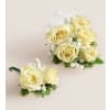 White Spray Rose Corsage and Boutonniere - Premium. An arrangement by Sicola's Florist. Delivery Instructions.