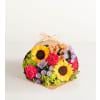 The Floral Embrace Wrapped Bouquet - Standard. An arrangement by Flowers of Jacksonville.