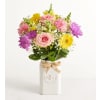 The Honey Bee Buzz™ for Spring - Deluxe. An arrangement by 1800flowers Encinitas.
