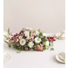 Romantic Blush™ Centerpiece - Premium. An arrangement by Sicola's Florist.