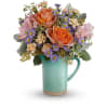 The Teleflora's Aqua Rose Bouquet - Standard. An arrangement by Marivel's Florist and Gifts.