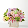 A Eggcellent Blooms Basket - Deluxe. An arrangement by Honie Rose Design.