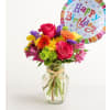 The Fields of Europe® Celebration with Happy Birthday Balloon - Standard. An arrangement by Flowers of Jacksonville.