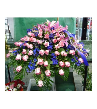 CASKET SPRAY- ROSES, DELPHINIUM, AND LILIES CASKET SPRAY- ROSES, DELPHINIUM, AND LILIES