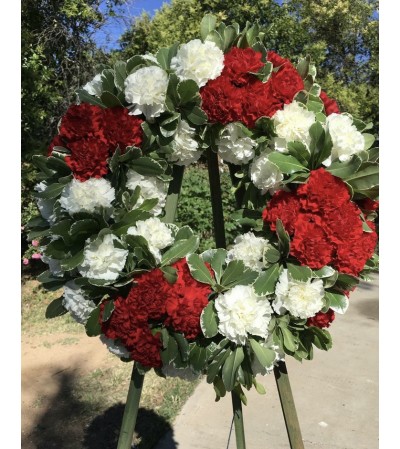 A Sympathy Wreath in Red/White A Sympathy Wreath in Red/White