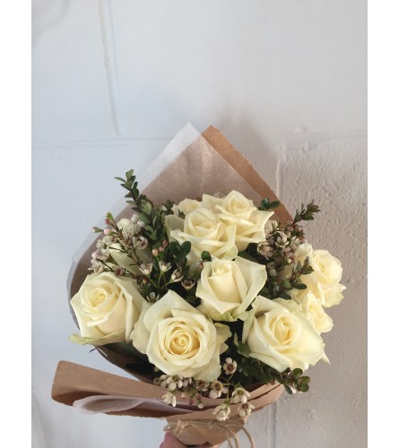 12 White Roses Wrapped