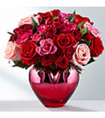 HOLD ME IN YOUR HEART - Deluxe. An arrangement by Fine's Flowers.