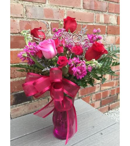 PURE ROMANCE. An arrangement by Metcalfe Florist and Pleasant View Greenhouses.
