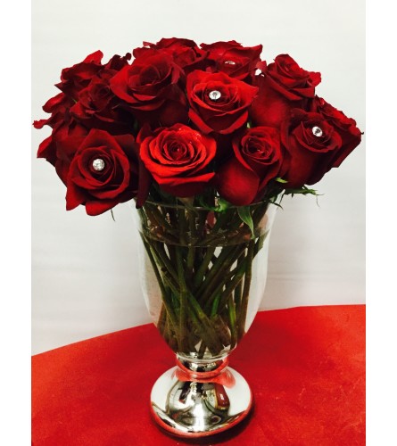 The Vera Rose - Deluxe. An arrangement by Clark's House of Flowers.