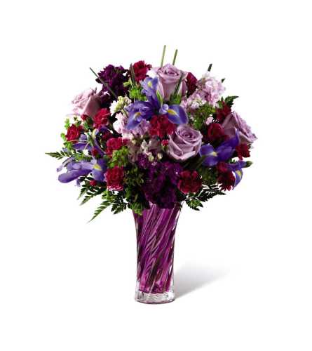 The FTD® Spring Garden® Bouquet-VASE INCLUDED - Deluxe. An arrangement by Osborne Florist.