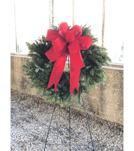 Fresh Frazier Fir wreath on easel