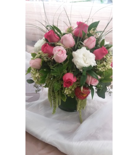 all shades of pink cylinder arrangement