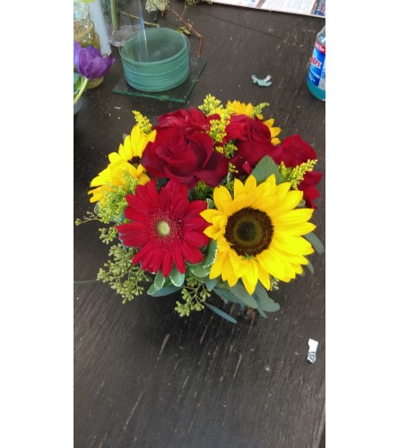 sun flowers and red gerber daisies