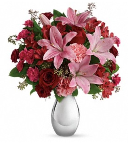 TF'S MOONLIGHT KISS - Deluxe. An arrangement by Fletcher Heights Florist.