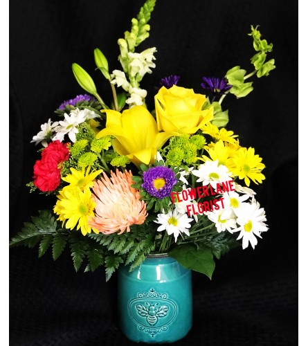 Bee-utiful You. An arrangement by Flower Lane.