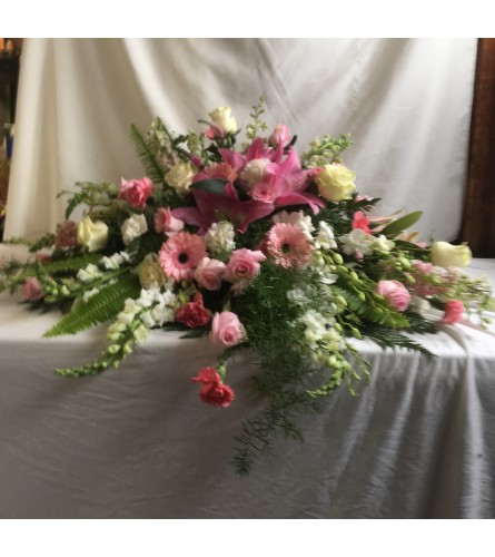 Pink and white casket cover