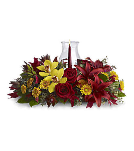 The Glow of Gratitude Centerpiece - Deluxe. An arrangement by Flowers of Charlotte.