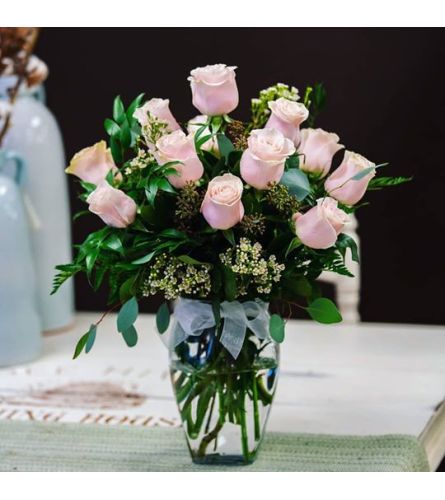12 Premium pink roses in a vase