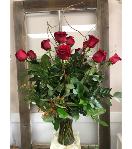 One Dozen Red Roses With Greenery