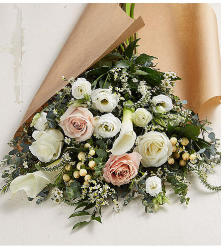 Marvelous Wrapped Bouquet. An arrangement by Lovingly.