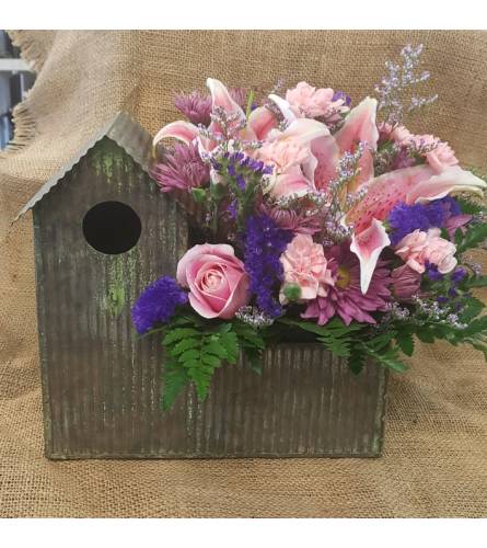 Birdhouse Full of Flowers