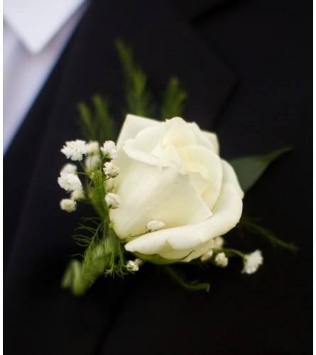 ROSE BOUTONNIERE TO MATCH DATE'S FLOWERS.