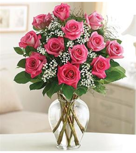 1 DOZEN PINK ROSES IN VASE WITH GREENS AND FILLER